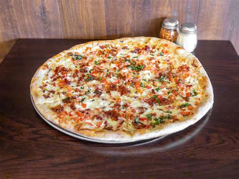 Illiano's pizza - Illiano's J&P Restaurants are simple, family-owned restaurants known for classic Italian food, sandwiches & a full bar. ... Seafood Pizza. Crab meat, baby clams, shrimp, tomato sauce & cheese. 12” $ 15. 14" $ 18. 16" $ 20. White Pizza. Broccoli, garlic, cheese, and fresh sliced tomatoes. 12” $ 14. 14” $ 16.